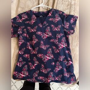 Scrub top and navy scrub pants